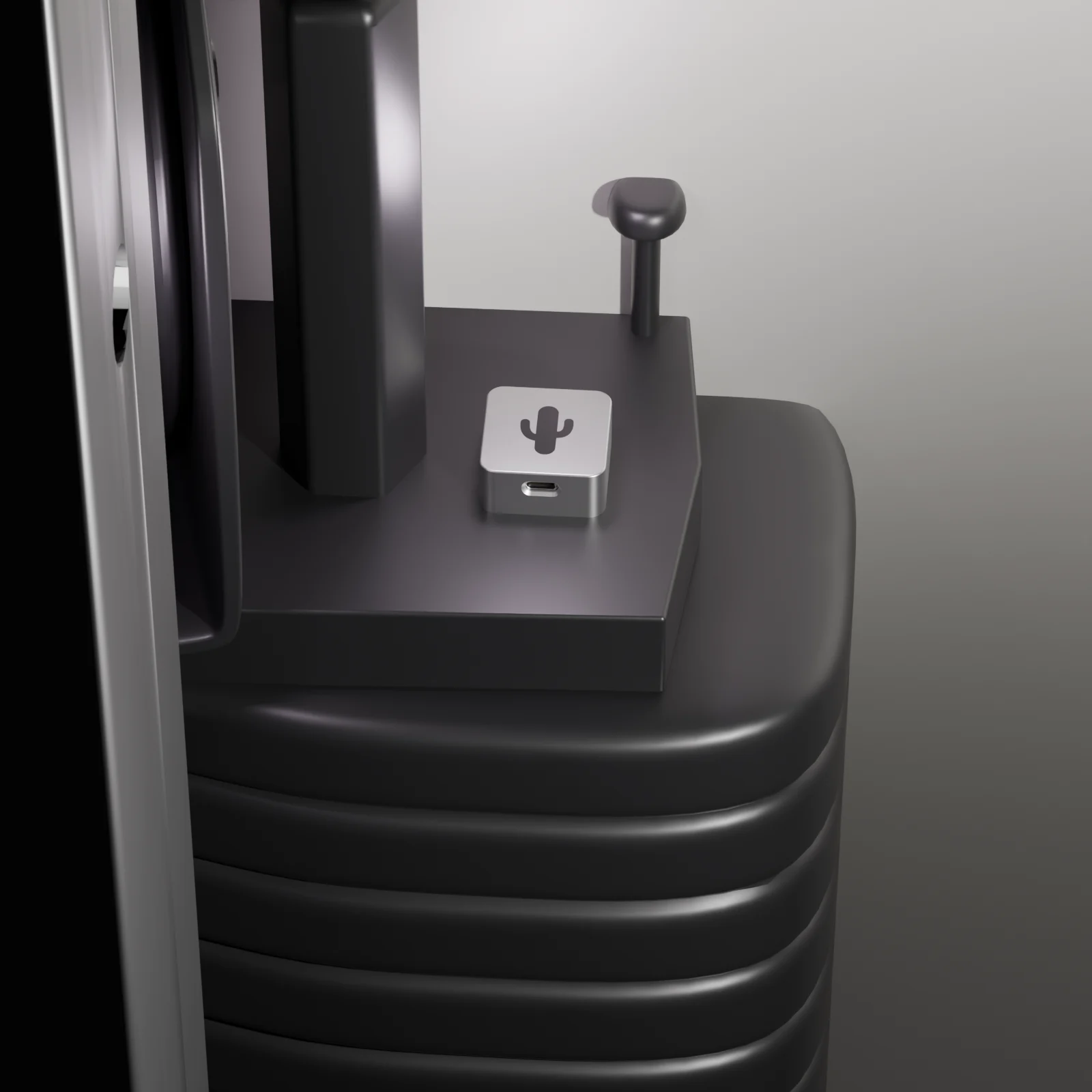 Corely Arc Pro in black on the top plate of a weight stack